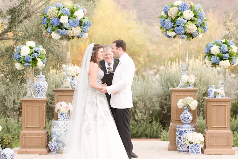 Pastel Blue and White Wedding in The Mountains With Florals | PartySlate