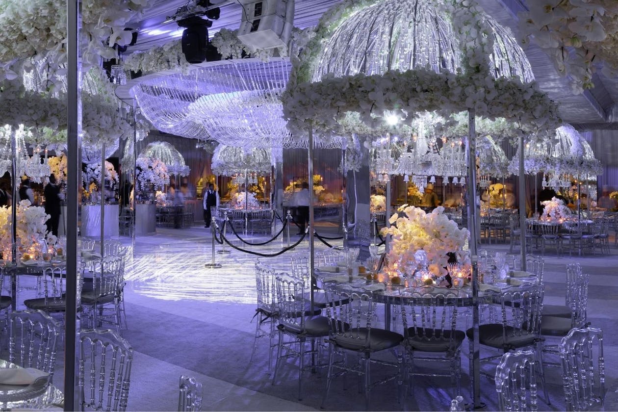 Crystal wonderland wedding with towering umbrella centerpieces | PartySlate