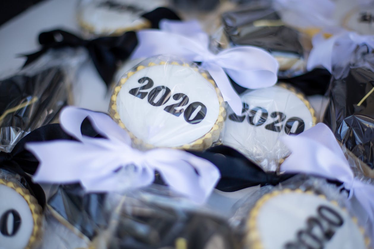 blakc and white personalized graduation cookies with the year written on them | PartySlate