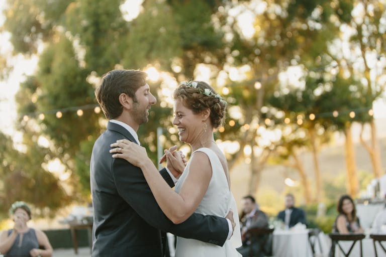 Bride and groom's first wedding dance at Catalina View Gardens | PartySlate