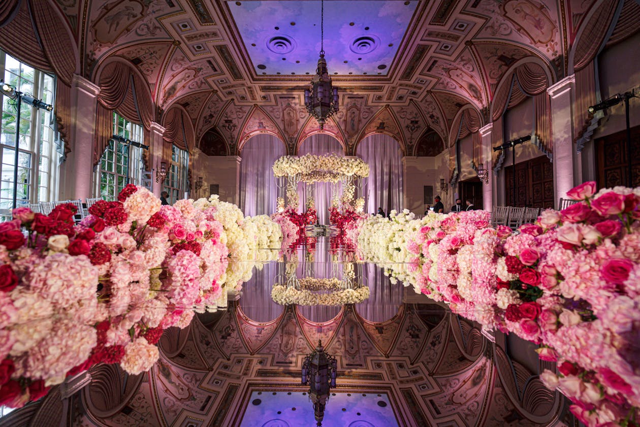 Lavish fairytale wedding ceremony with pink florals at The Breakers Palm Beach | PartySlate