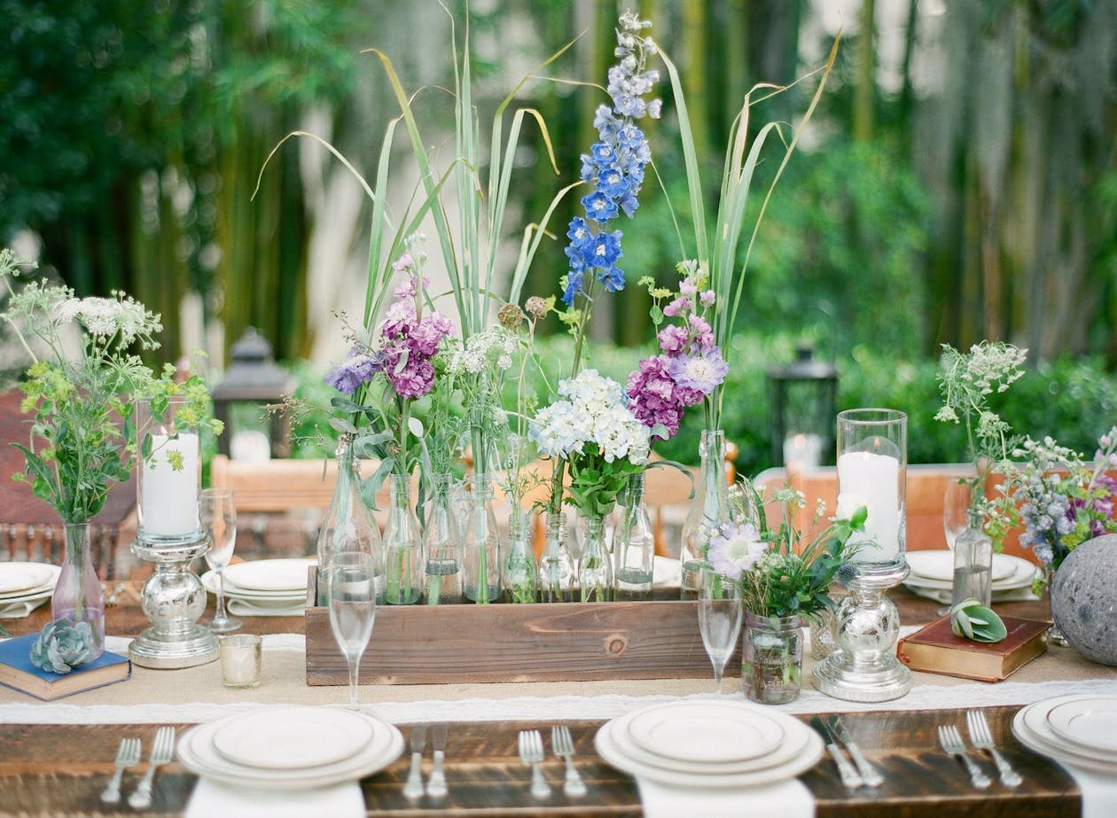 Garden wedding theme with wildflower centerpieces | PartySlate