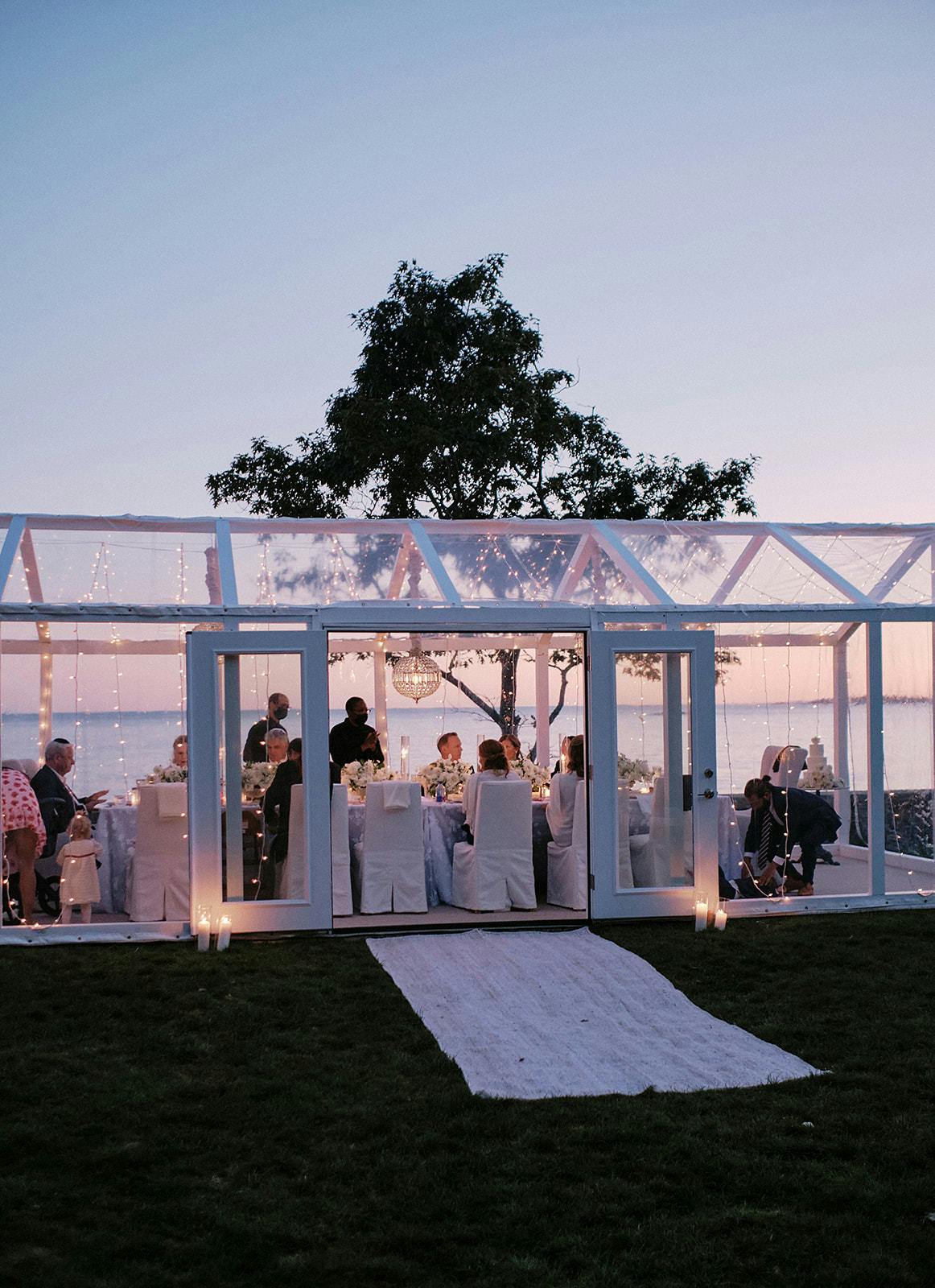 Luxurious garden wedding with transparent tenting | PartySlate
