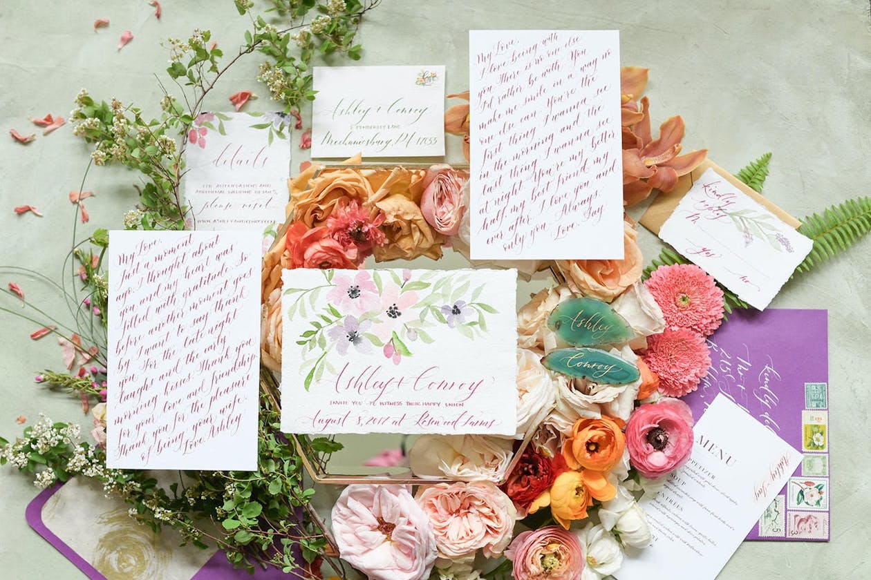 Garden wedding invitation suite in pink calligraphy | PartySlate