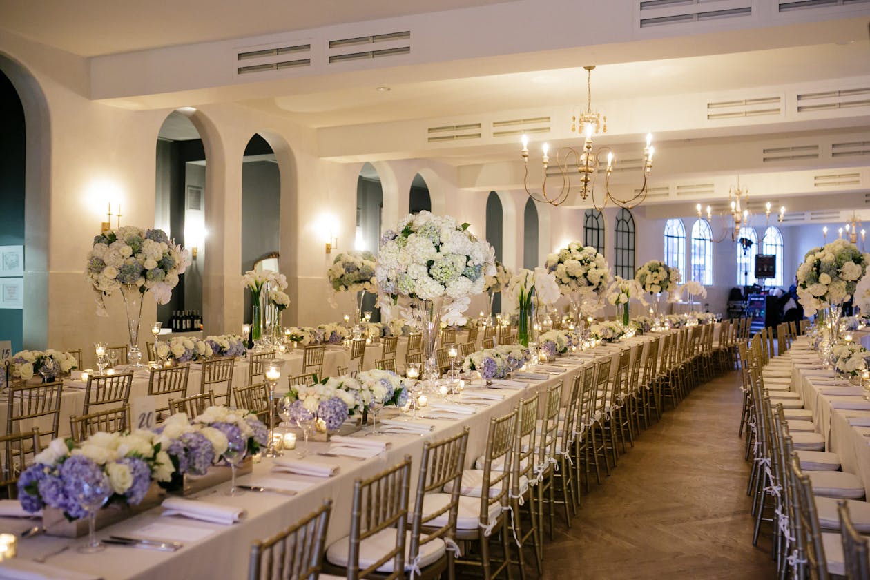 Ballroom wedding with white and blue preppy wedding centerpieces | PartySlate
