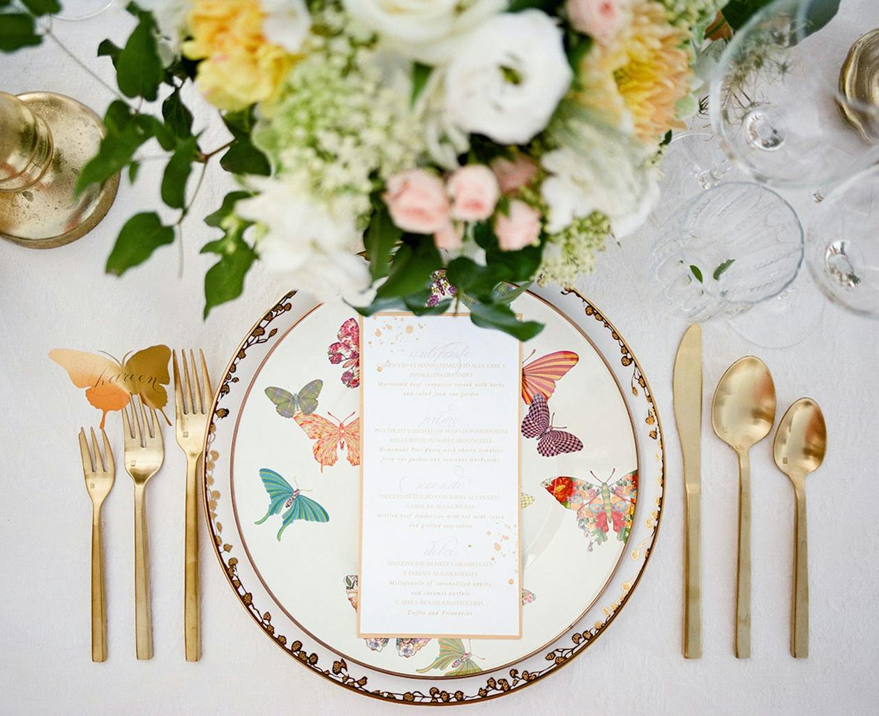 Summer garden wedding place setting with butterfly chinaware | PartySlate
