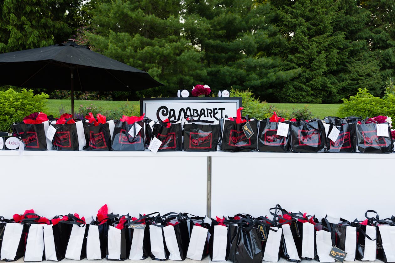 Cabaret themed graduation party with party favor table | PartySlate