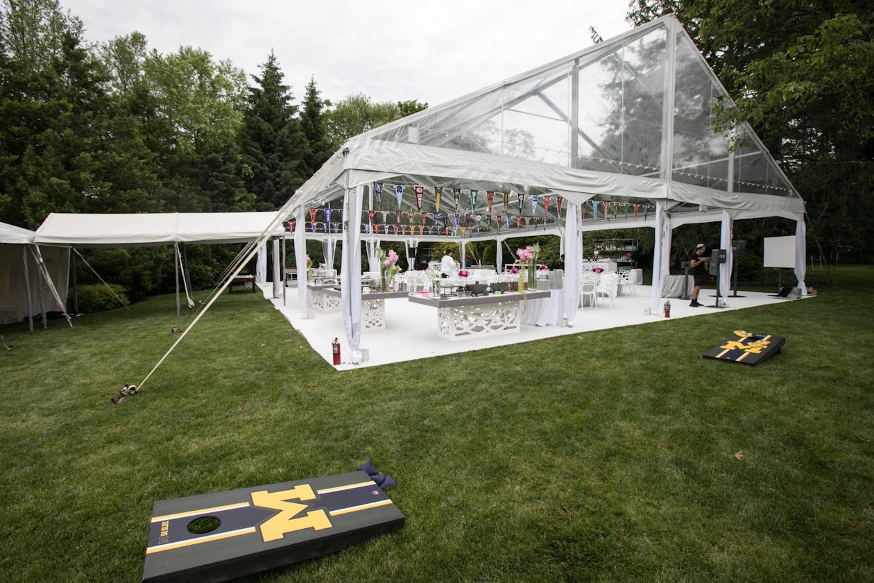 graduation party with tented area and lawn games | PartySlate