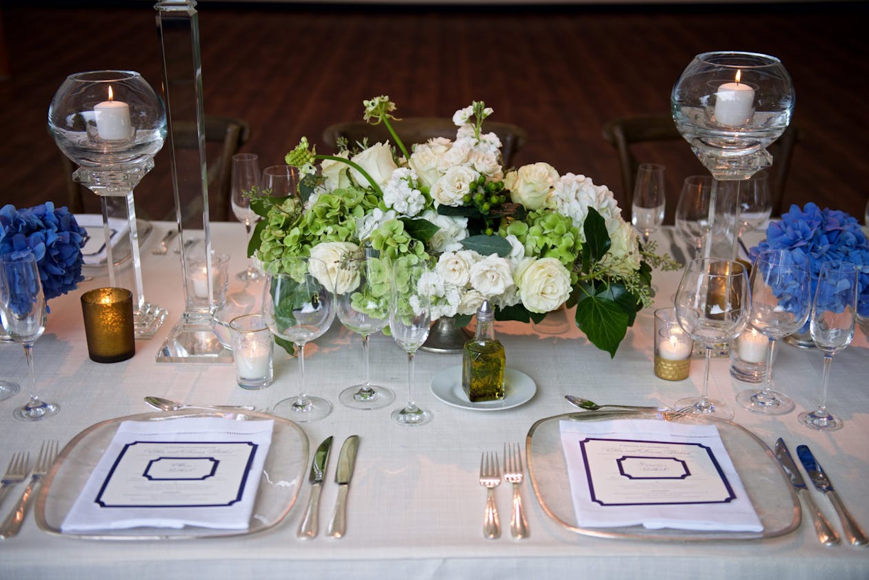 Preppy tented wedding with green and white centerpieces | PartySlate