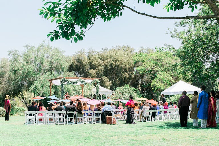 Vibrant South Asian wedding ceremony at South Coast Botanic Garden | PartySlate