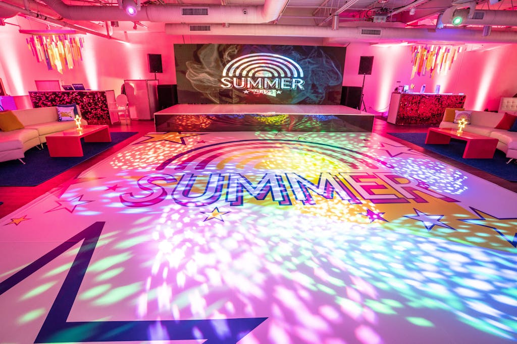 Rainbow bat mitzvah with colorful dance floor | PartySlate