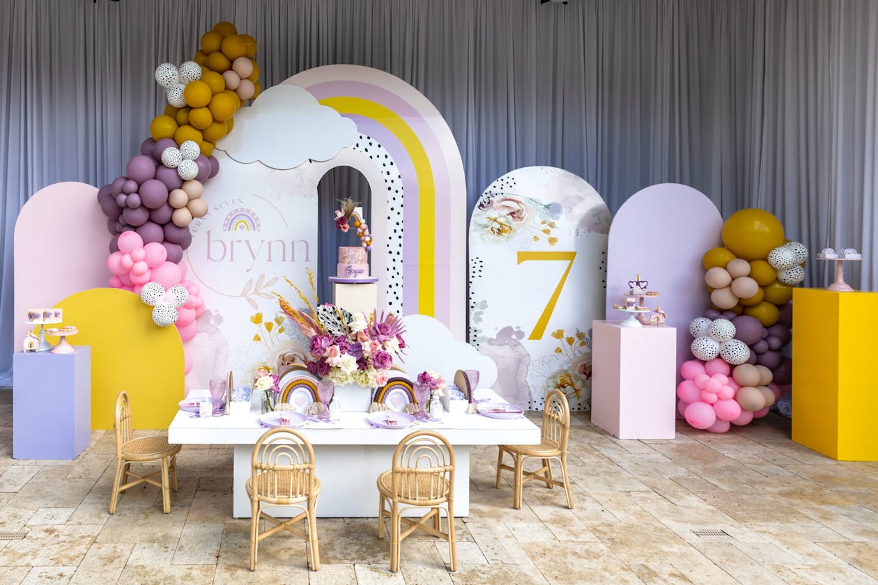 Boho birthday party for a child with purple accents and rainbow details | PartySlate
