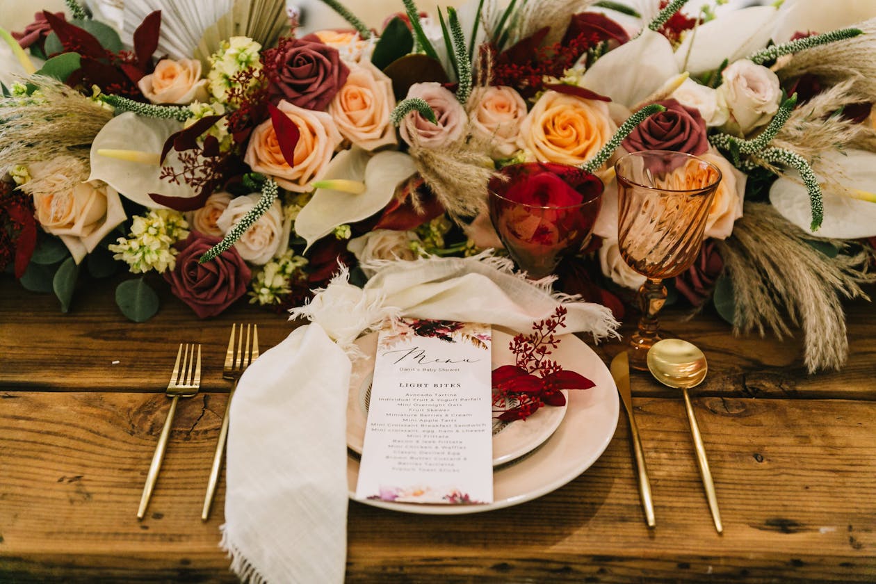 Maroon and cream boho floral centerpiece for fall | PartySlate