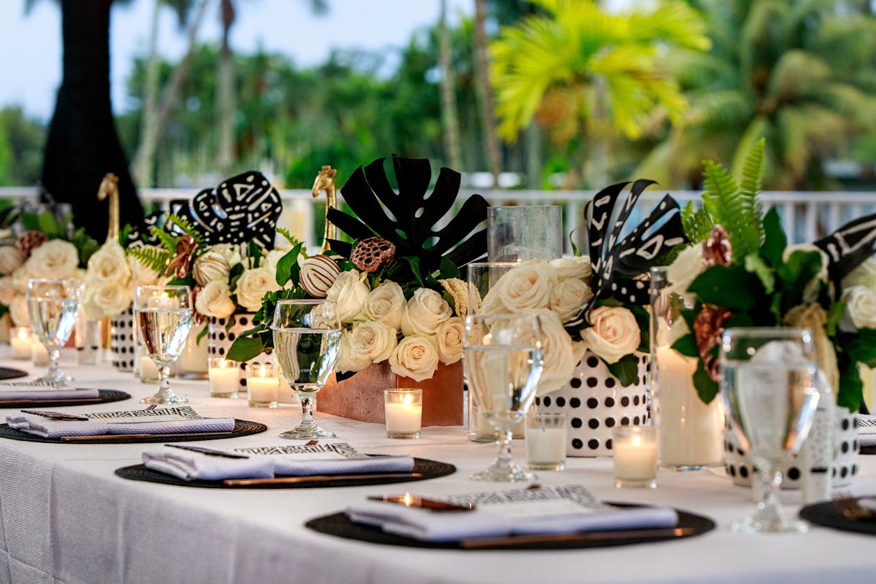 Tropical safari baby shower tablescape in green and gold | PartySlate