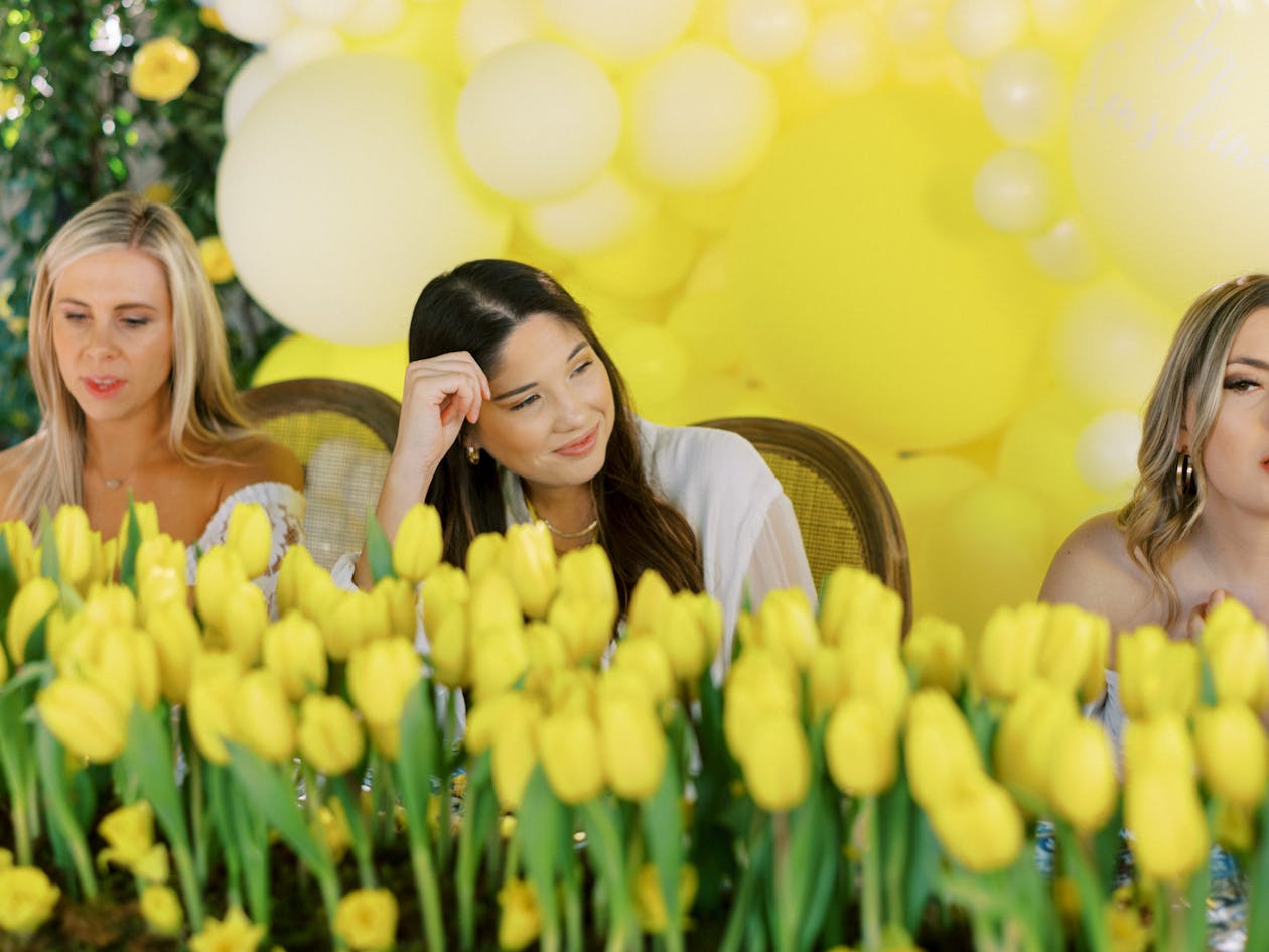 Yellow baby shower with yellow tulip centerpieces | PartySlate