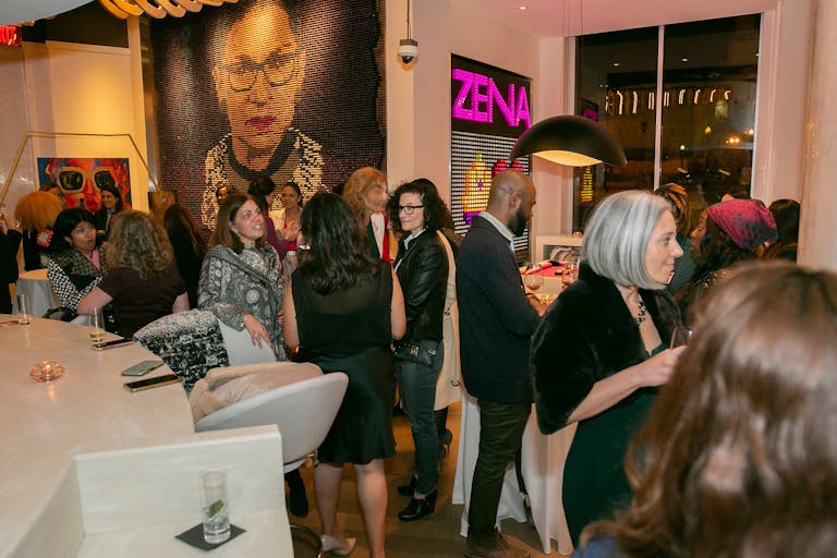 Reception and Art exhibit at hotel zena in d.c with guests talking in bar and lounge area | PartySlate