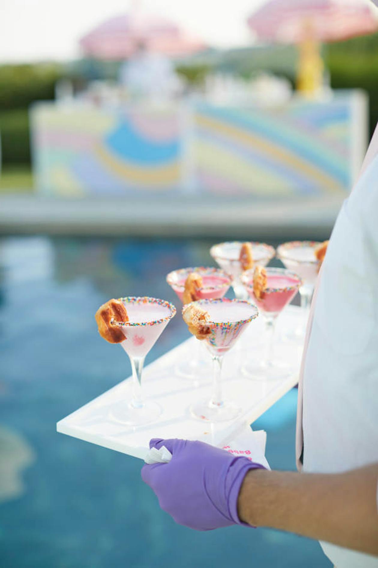 pink martinis at baby shower with sprinkles around the rim of the glass | PartySlate