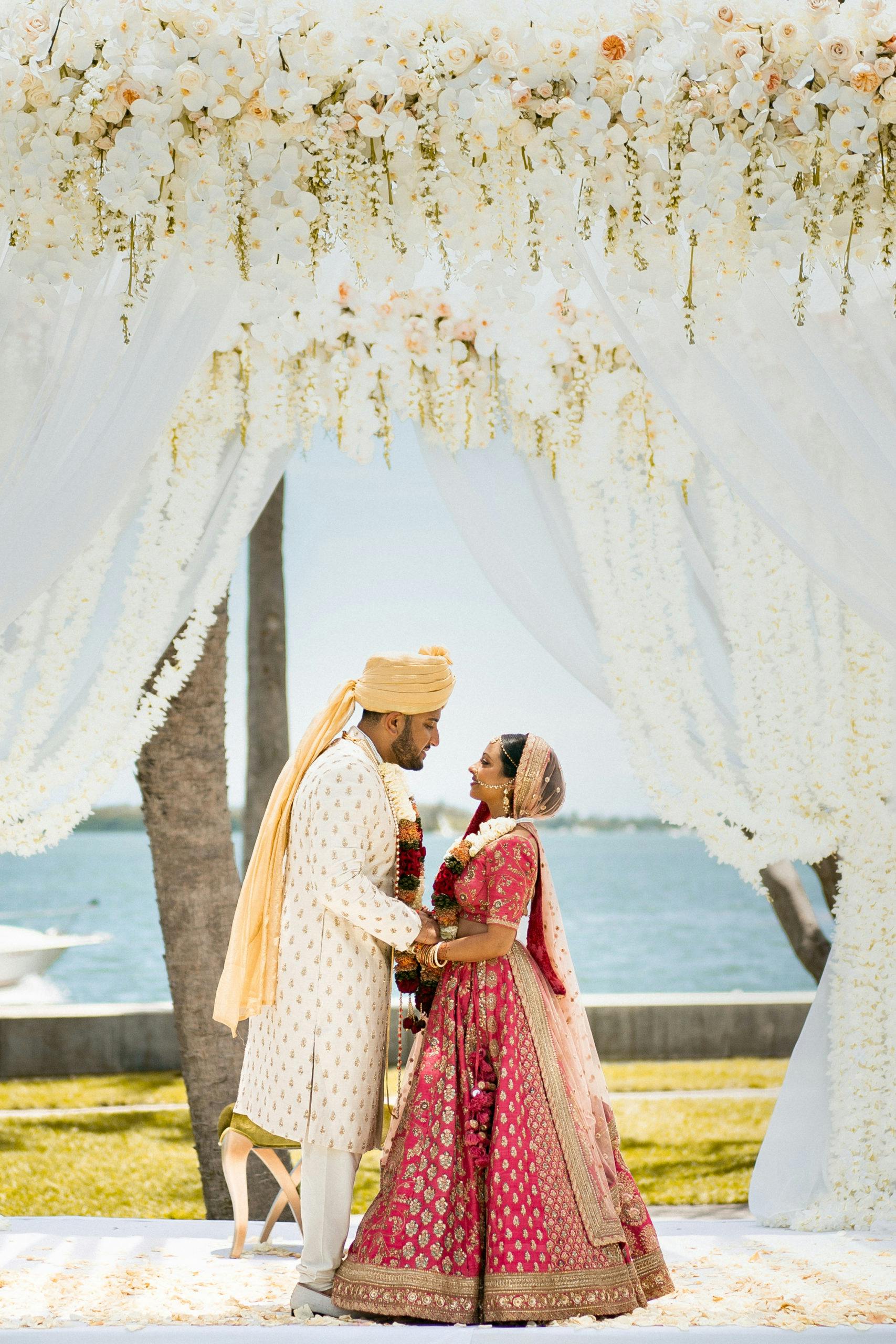 Bride and groom at their ocean-side wedding
