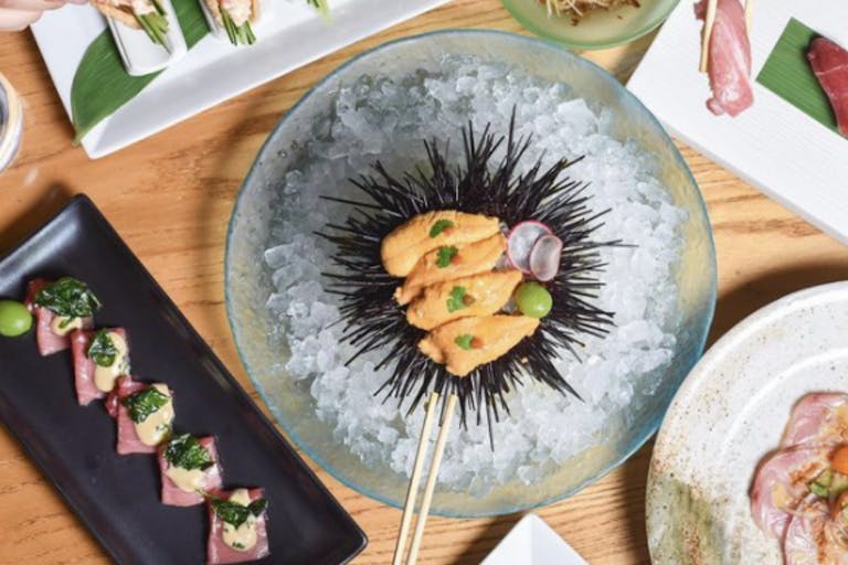 Nobu Washington D.C. Japanese private dining dc space with booth seating and a bar | PartySlate