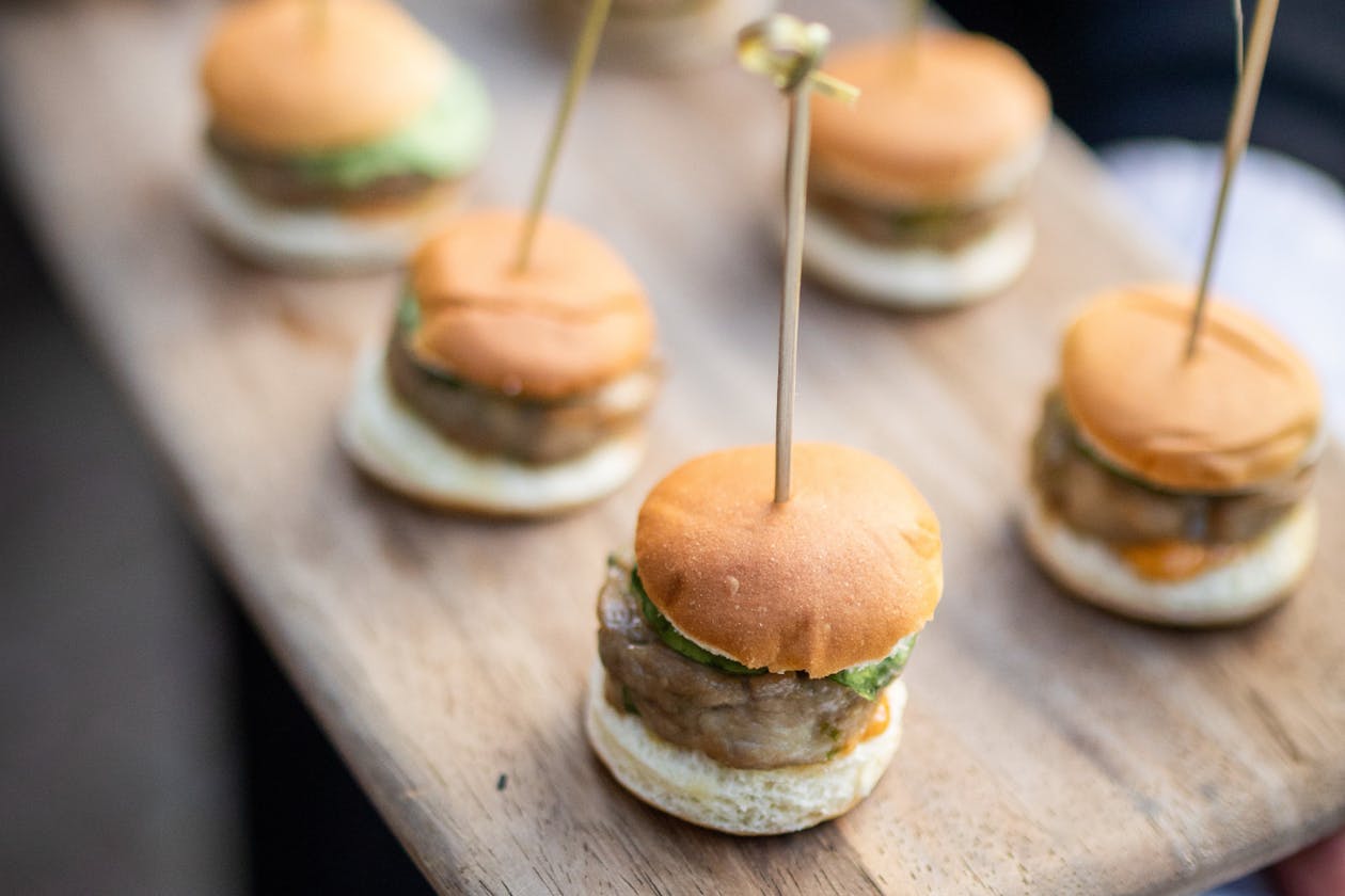 mini hamburger sliders with a toothpick | PartySlate