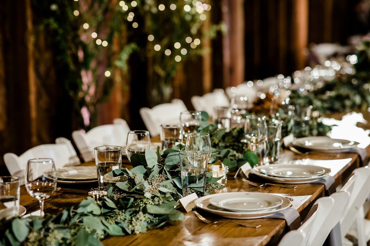 Rustic wedding with greenery table runner | PartySlate