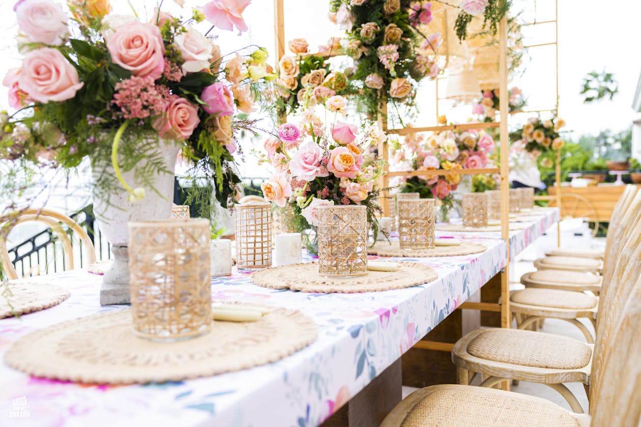 Boho wedding shower with pink flowers and wicker details | PartySlate