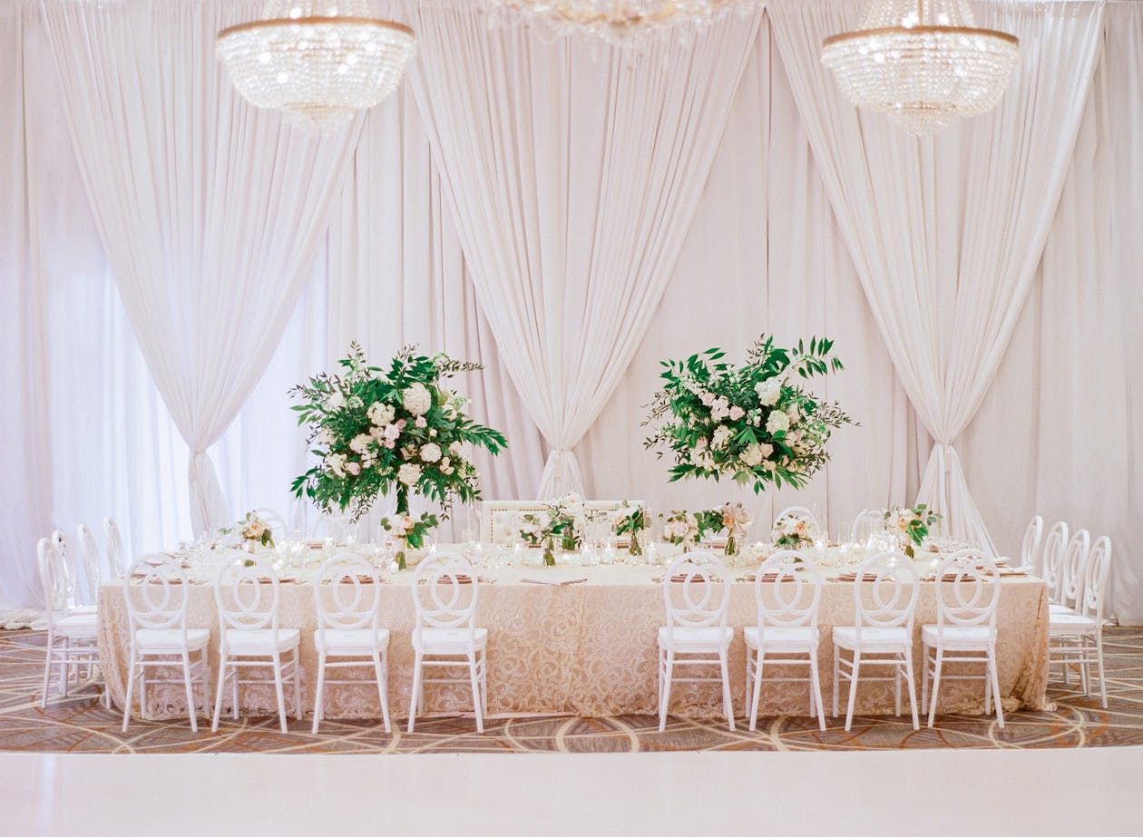Romantic summer wedding with white drapery | PartySlate