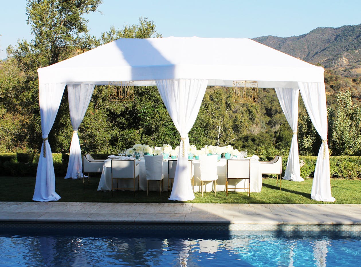 outdoor birthday dinner party by a pool | PartySlate