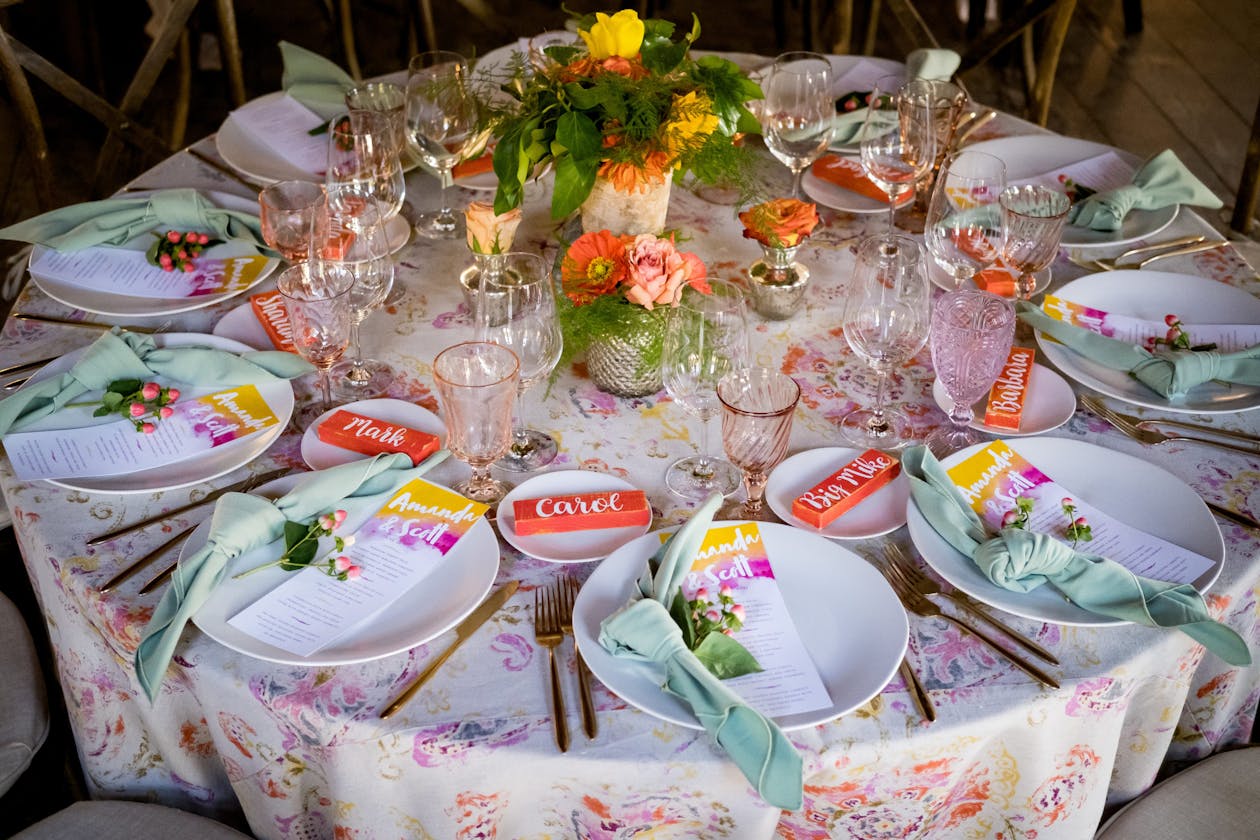 Colorful and bright floral wedding table linen | PartySlate