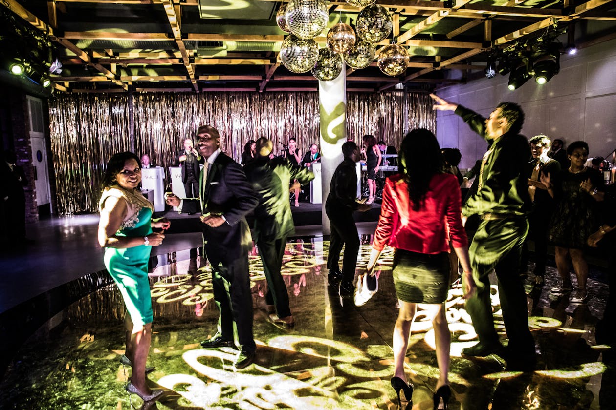 live band playing at birthday party with guests on the dance floor | PartySlate