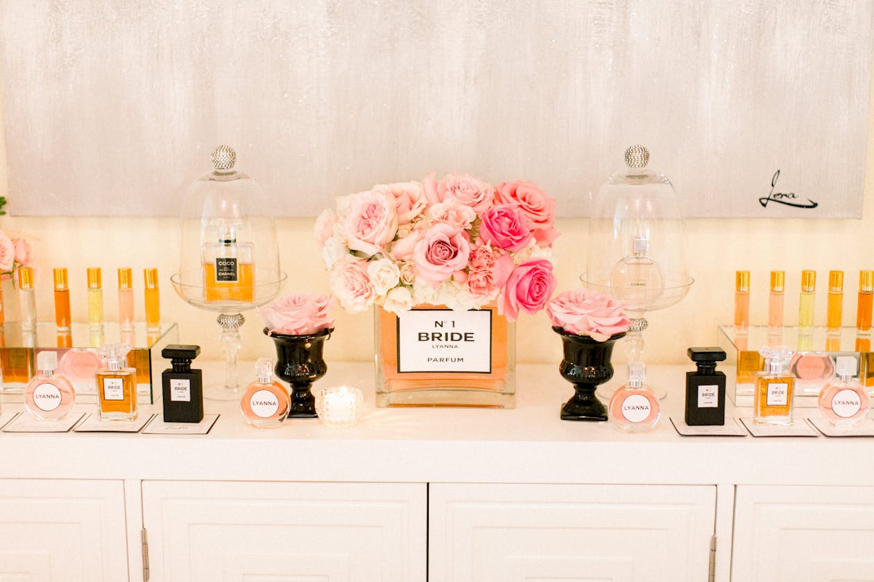 Perfume display at perfume-themed wedding shower | PartySlate