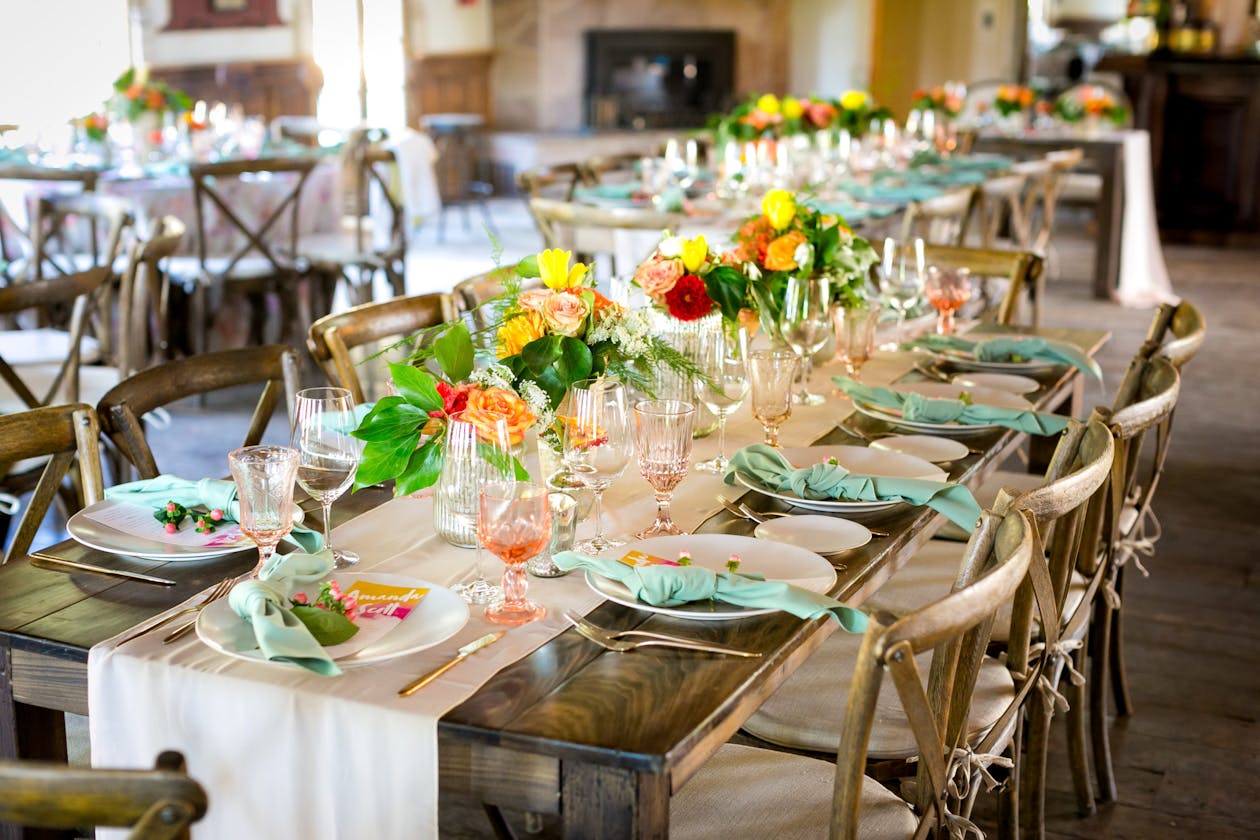 Summer wedding with sea foam napkins and bright florals | PartySlate