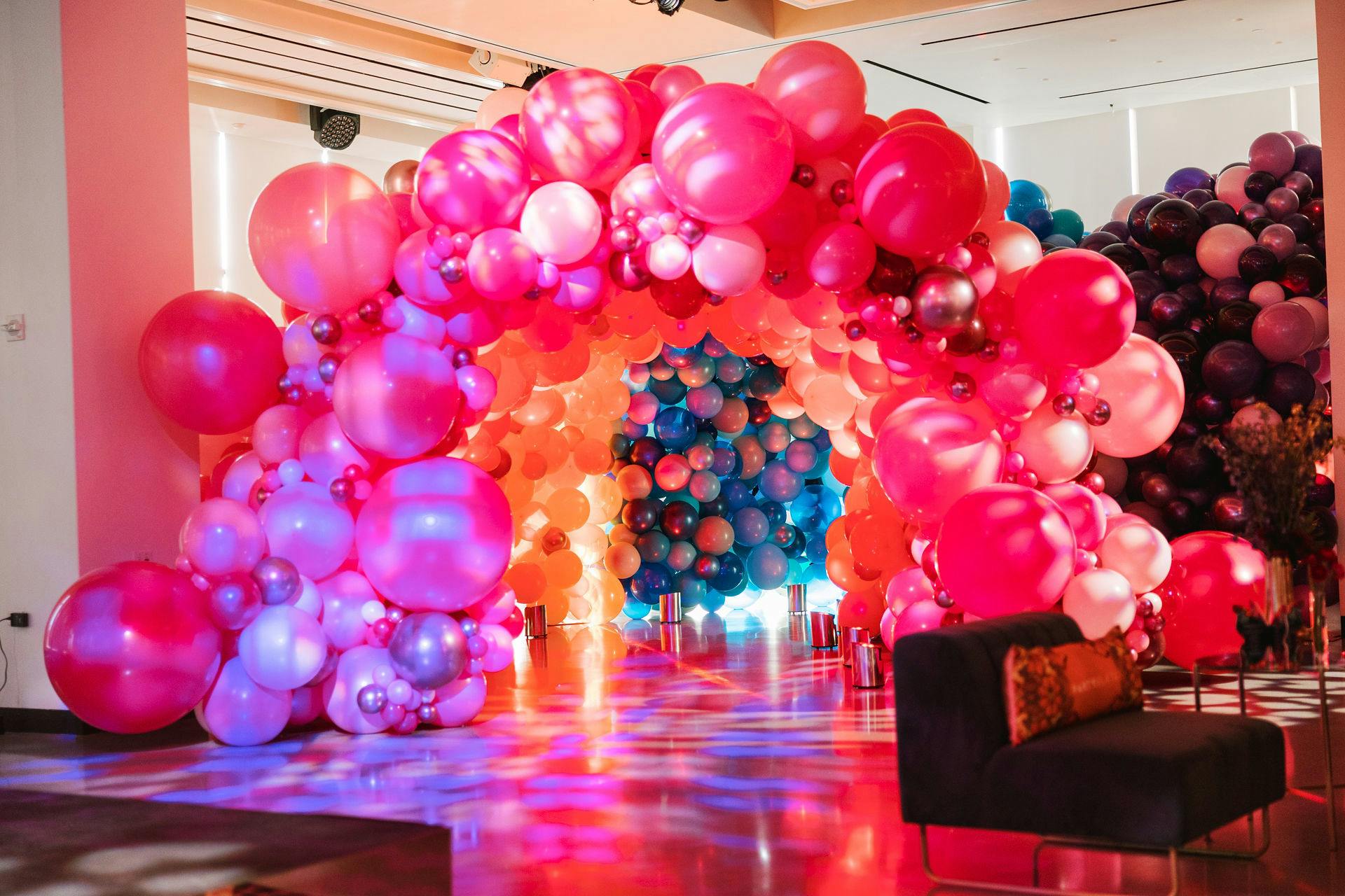 Rainbow corporate balloon arch for New York PartySlate Party | PartySlate