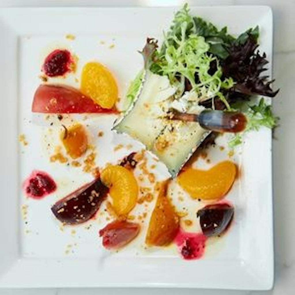 Deconstructed meal on white plate for corporate function | PartySlate