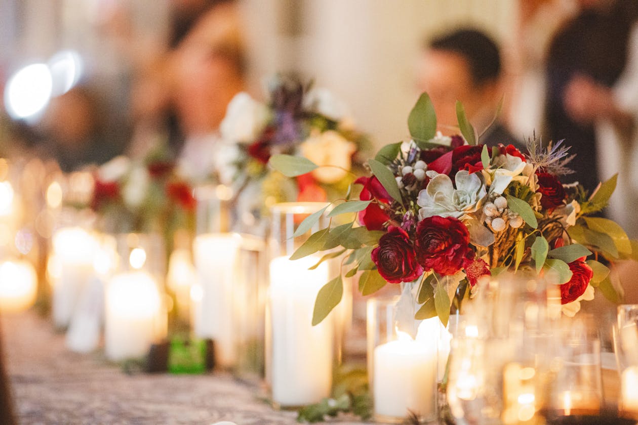 Winter wedding candle centerpieces with rose and succulents | PartySlate