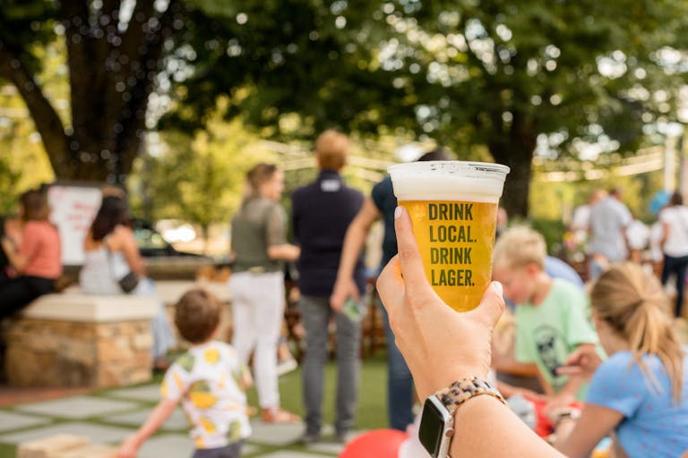 Vibrant Beer Garden at The Street Chestnut Hill in Boston, Massachusetts locally sourced catering trends | PartySlate