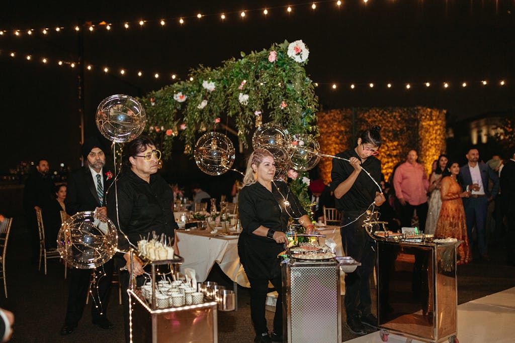 South Asian wedding reception with edible balloon station | PartySlate