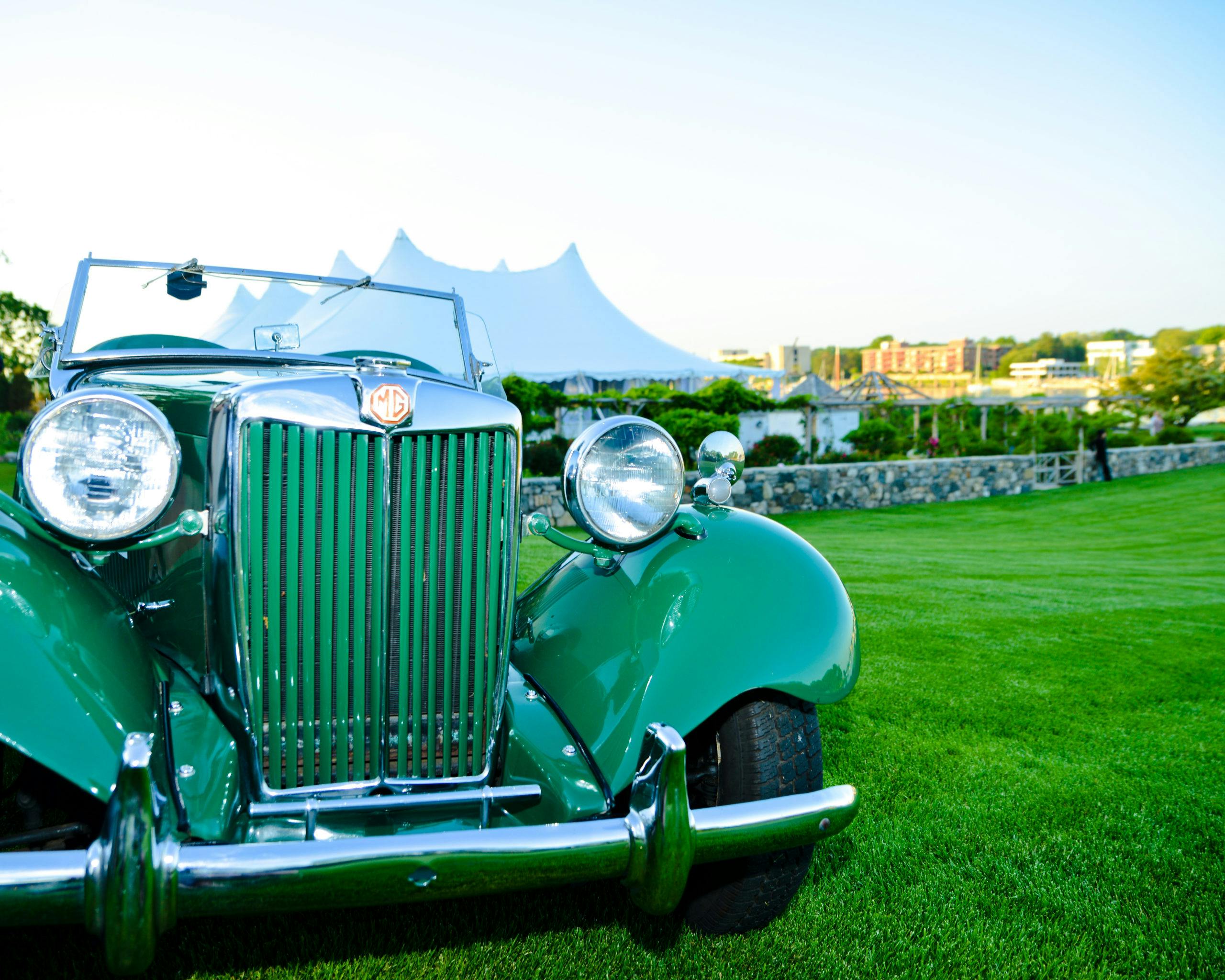 Gatsy themed party with a bright green vintage car