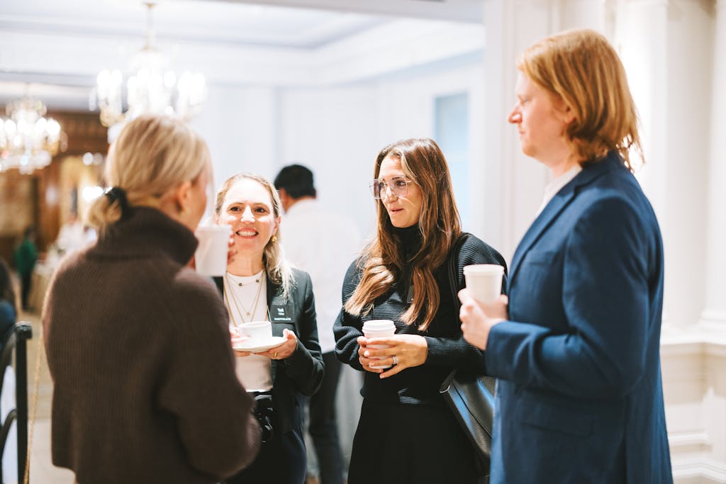 Guests in conversation at a party