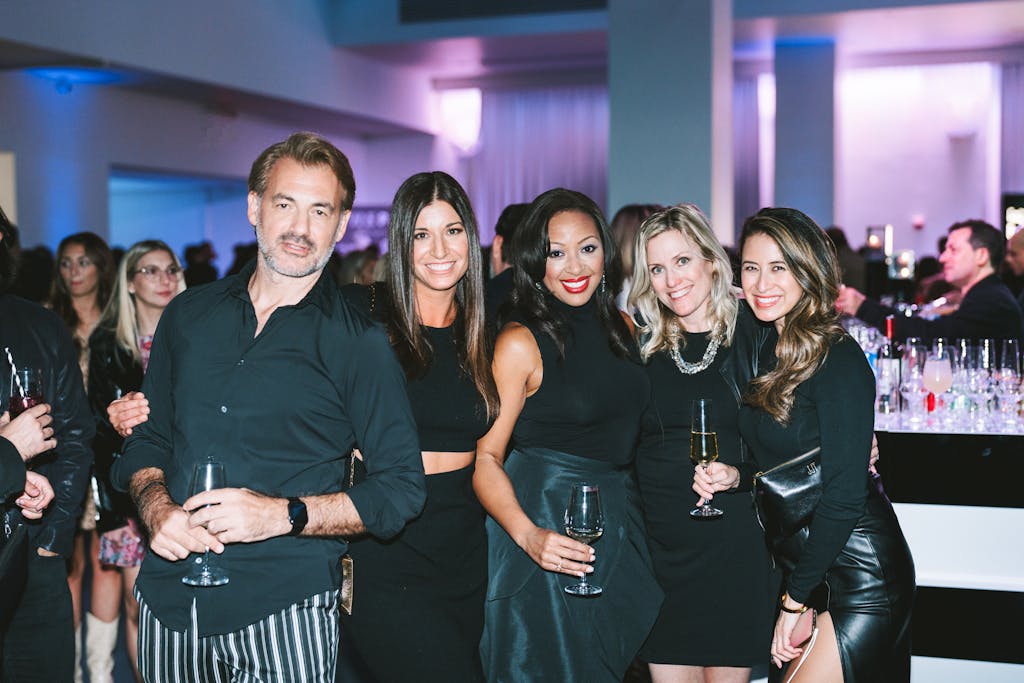 Group of people pose at PartySlate NYC event