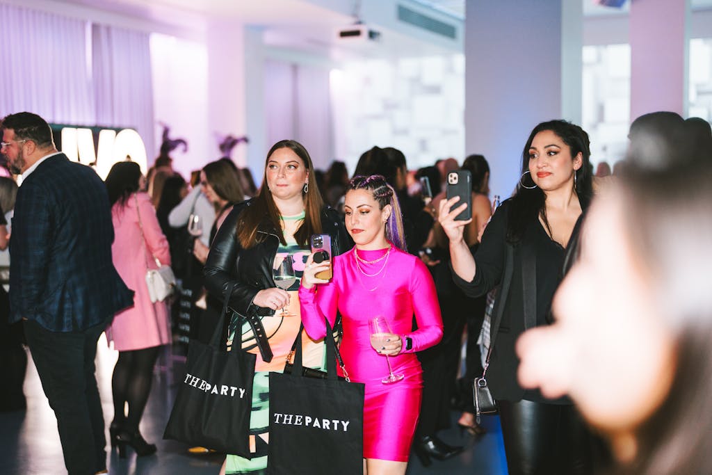 Guests taking photos at PartySlate event