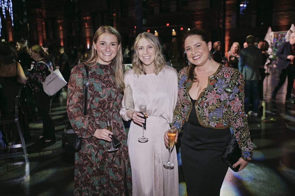 Three women posing for a picture